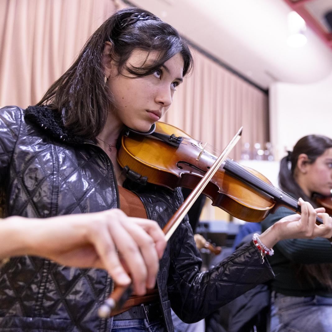  A student plays violin